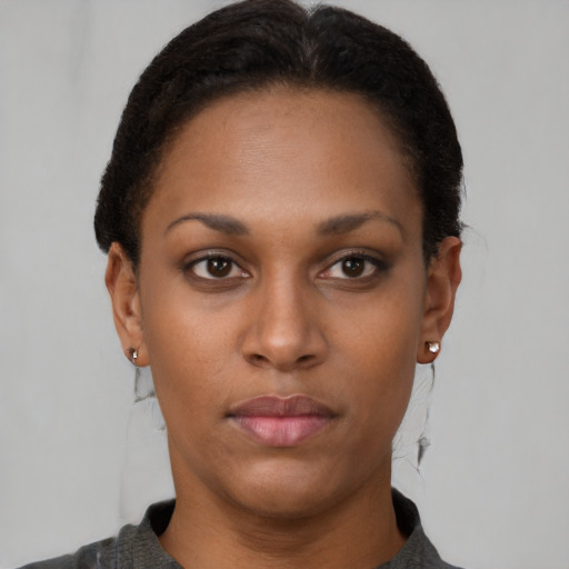 Neutral latino young-adult female with short  black hair and brown eyes