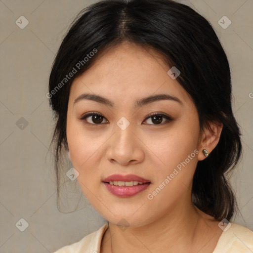 Joyful asian young-adult female with medium  brown hair and brown eyes