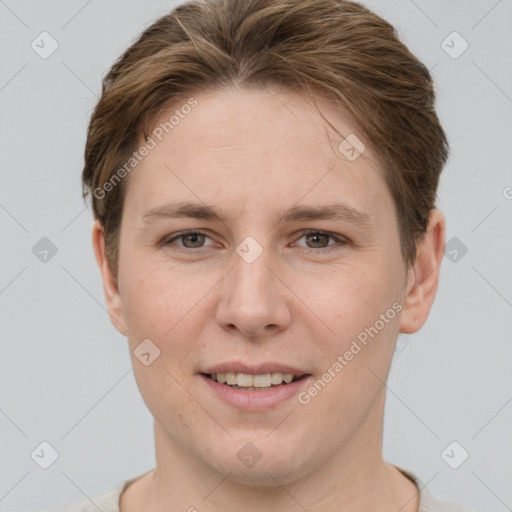 Joyful white young-adult female with short  brown hair and grey eyes