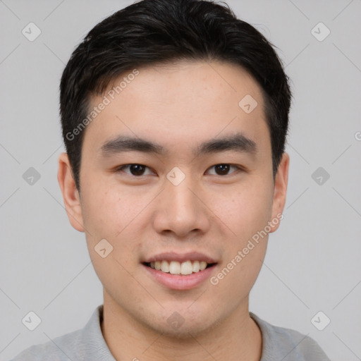 Joyful white young-adult male with short  black hair and brown eyes