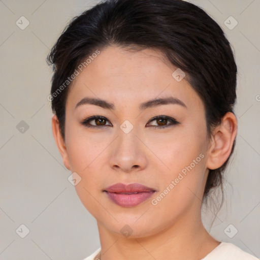 Joyful asian young-adult female with medium  brown hair and brown eyes