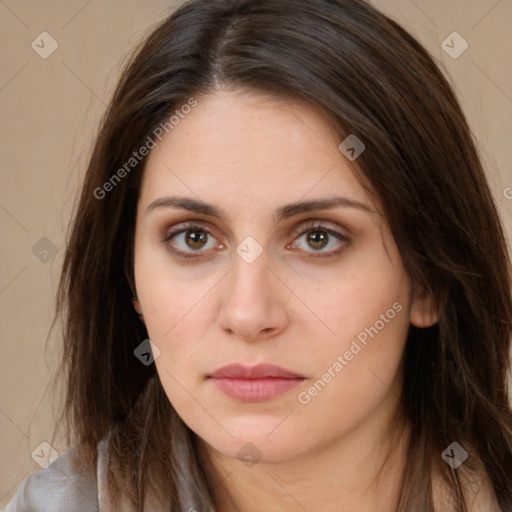 Neutral white young-adult female with long  brown hair and brown eyes