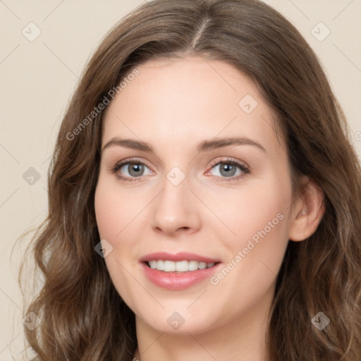 Joyful white young-adult female with long  brown hair and green eyes