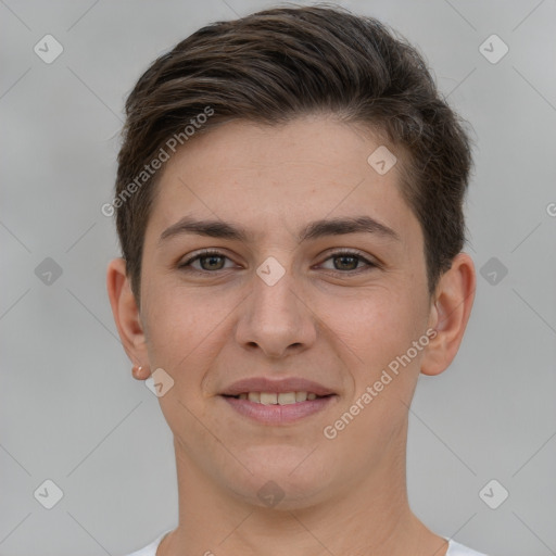 Joyful white young-adult female with short  brown hair and brown eyes