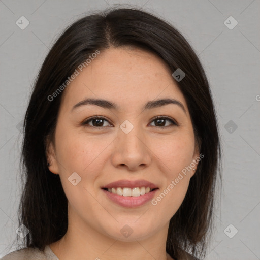 Joyful latino young-adult female with medium  brown hair and brown eyes