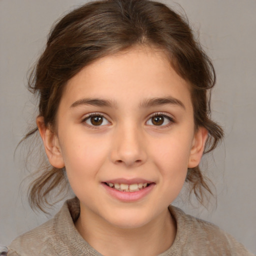 Joyful white child female with medium  brown hair and brown eyes