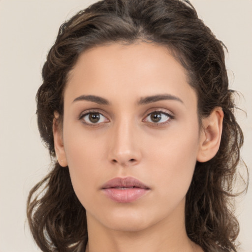 Neutral white young-adult female with medium  brown hair and brown eyes