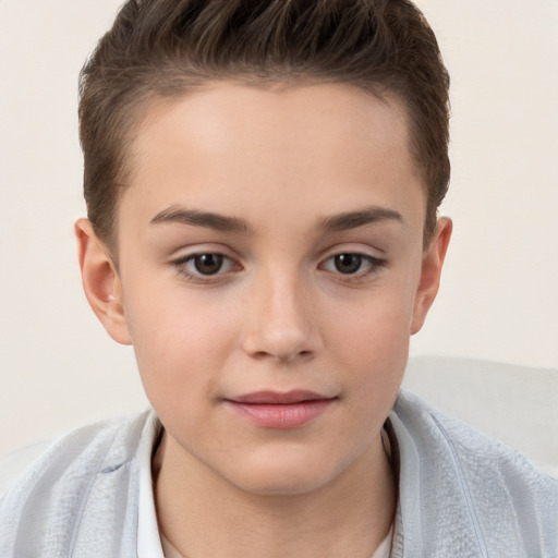 Joyful white child female with short  brown hair and brown eyes