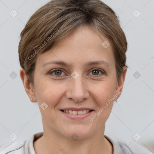 Joyful white young-adult female with short  brown hair and grey eyes