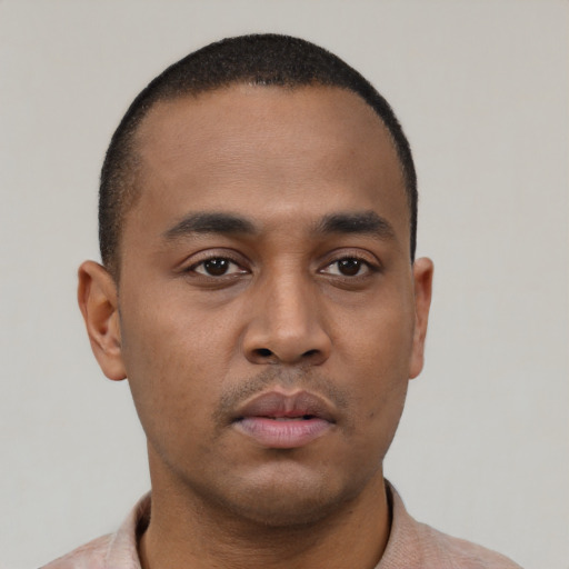 Neutral black young-adult male with short  black hair and brown eyes