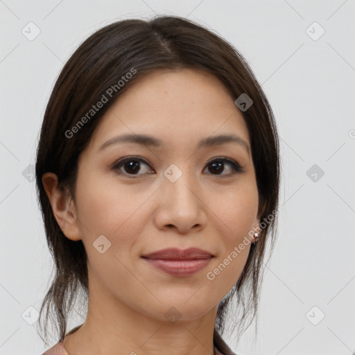 Joyful latino young-adult female with medium  brown hair and brown eyes