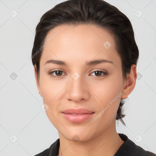 Joyful white young-adult female with short  black hair and brown eyes