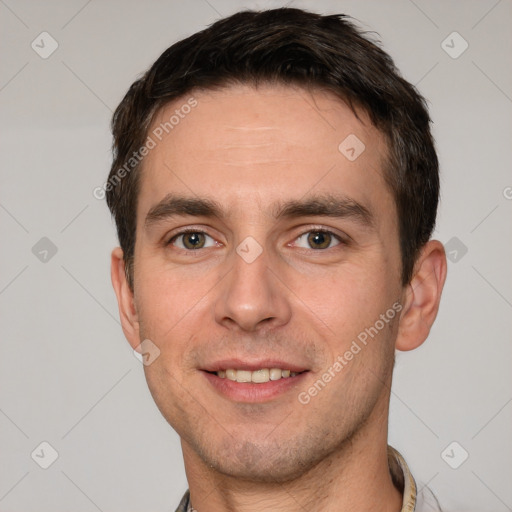 Joyful white young-adult male with short  brown hair and brown eyes