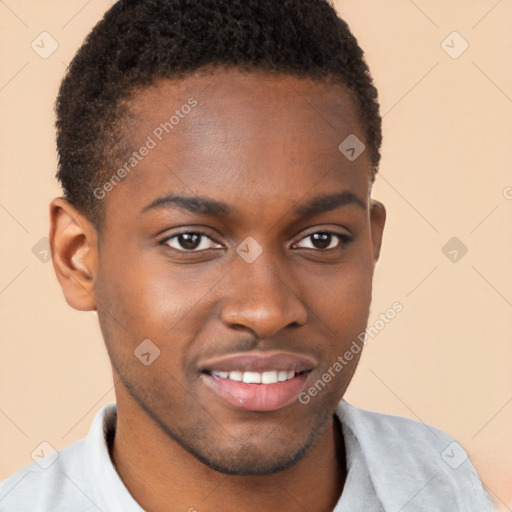 Joyful black young-adult male with short  brown hair and brown eyes