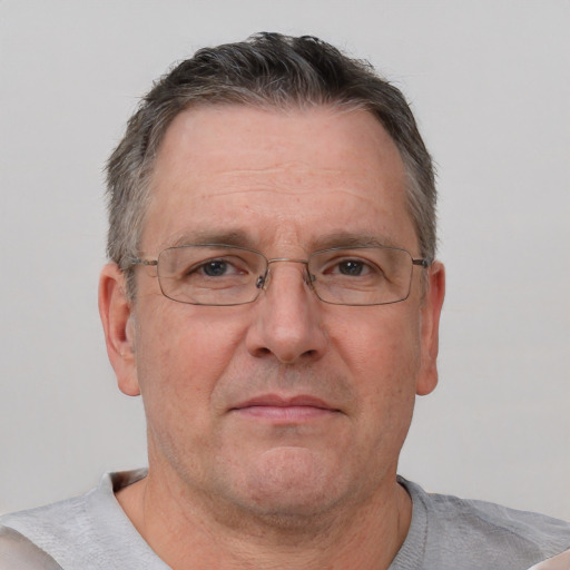 Neutral white middle-aged male with short  brown hair and brown eyes