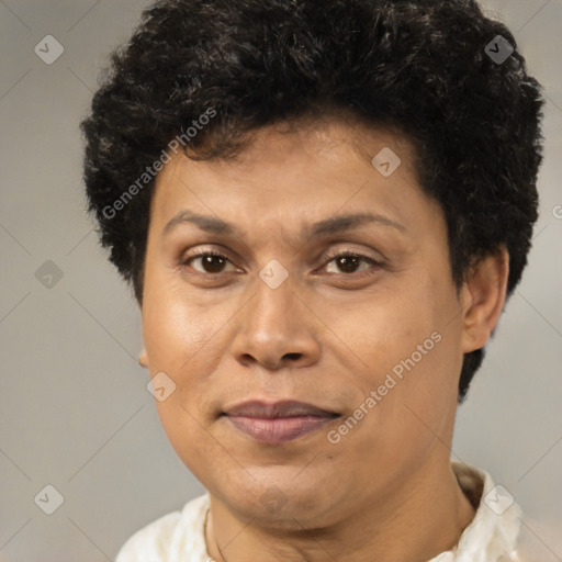 Joyful black adult male with short  brown hair and brown eyes