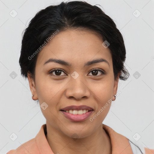 Joyful latino young-adult female with short  brown hair and brown eyes