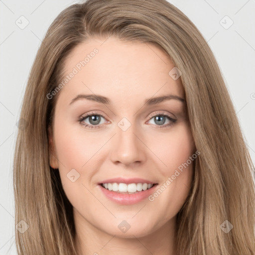 Joyful white young-adult female with long  brown hair and green eyes