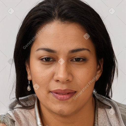 Joyful latino young-adult female with long  brown hair and brown eyes