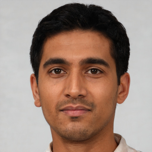 Neutral latino young-adult male with short  black hair and brown eyes