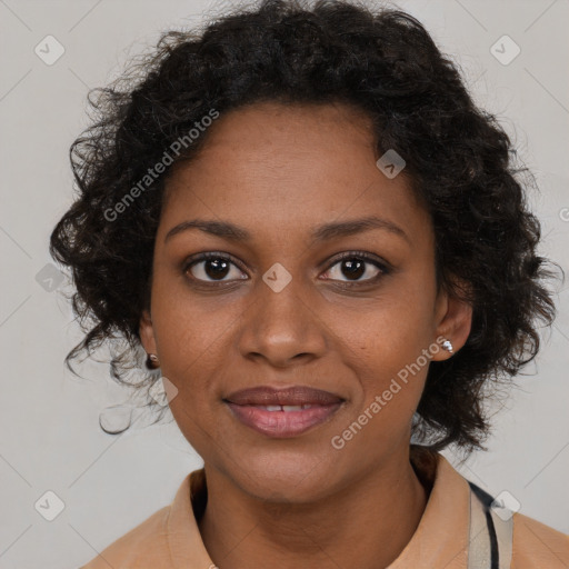 Joyful black young-adult female with long  brown hair and brown eyes