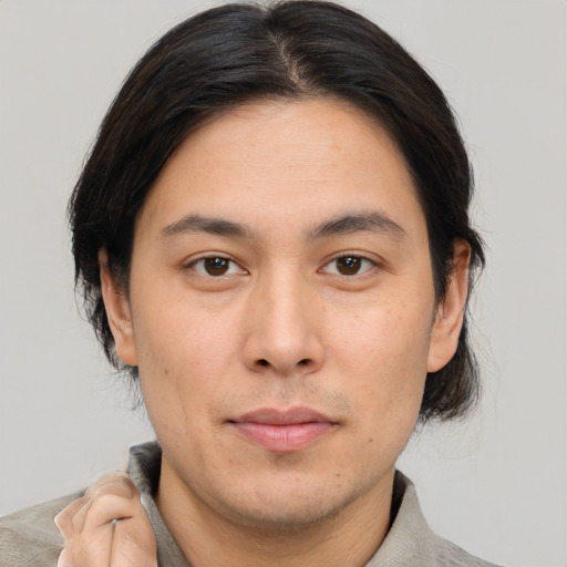 Neutral asian young-adult male with short  brown hair and brown eyes