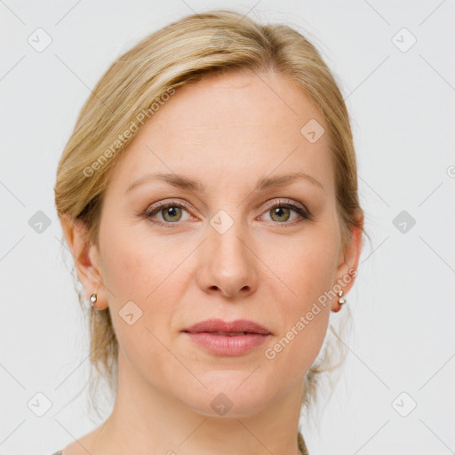 Joyful white young-adult female with medium  brown hair and blue eyes