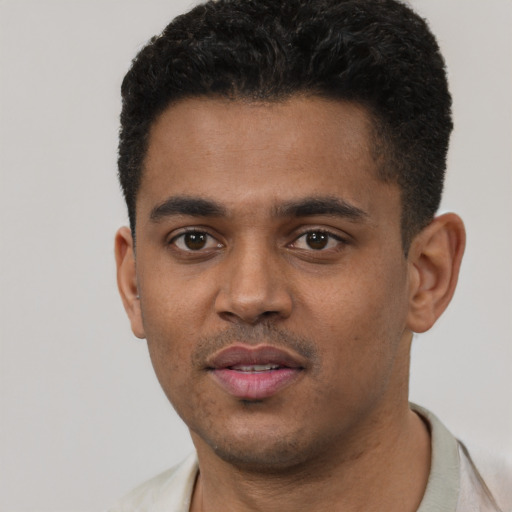 Neutral black young-adult male with short  black hair and brown eyes