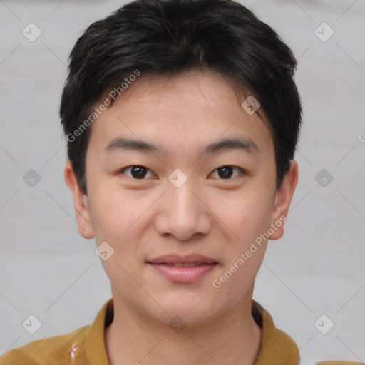 Joyful asian young-adult male with short  brown hair and brown eyes