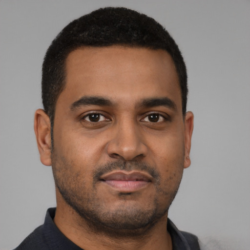 Neutral black young-adult male with short  black hair and brown eyes