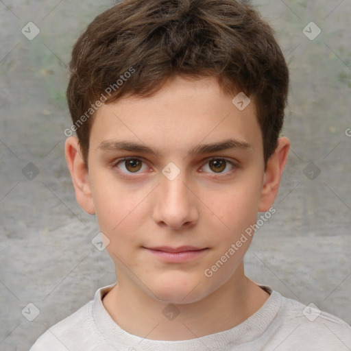 Joyful white child male with short  brown hair and brown eyes