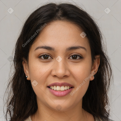 Joyful latino young-adult female with long  brown hair and brown eyes