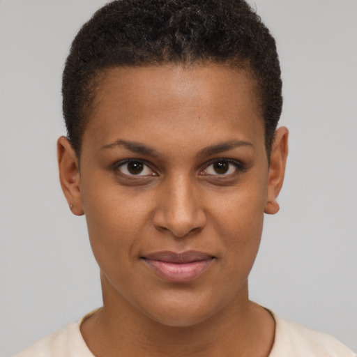 Joyful black young-adult female with short  brown hair and brown eyes