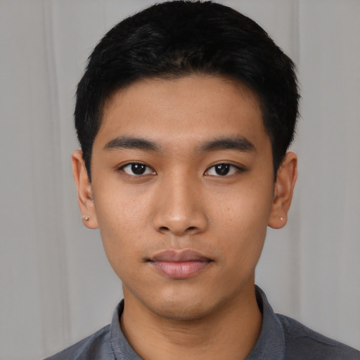 Neutral asian young-adult male with short  black hair and brown eyes