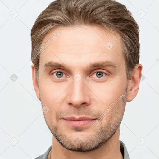 Neutral white young-adult male with short  brown hair and brown eyes