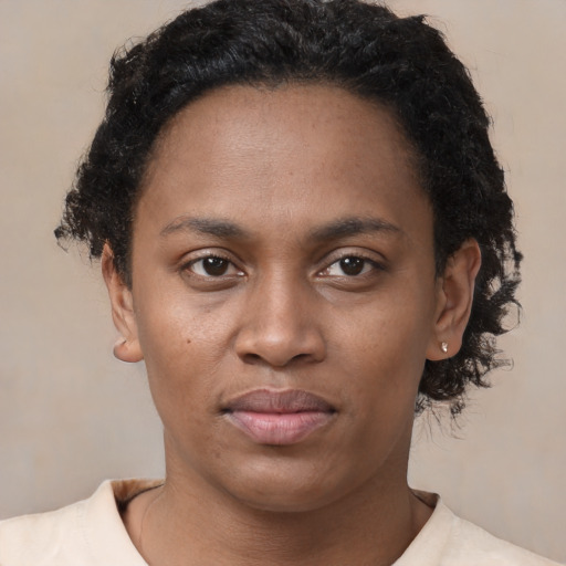 Neutral latino young-adult female with short  brown hair and brown eyes