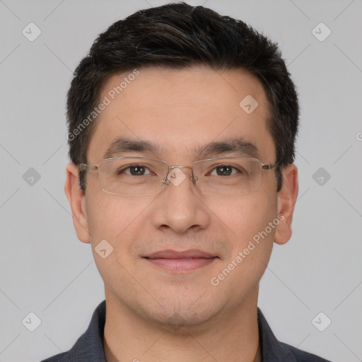 Joyful white young-adult male with short  black hair and brown eyes