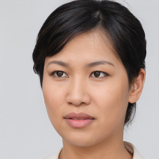Neutral asian young-adult female with medium  brown hair and brown eyes