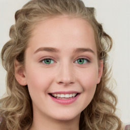 Joyful white young-adult female with long  brown hair and green eyes