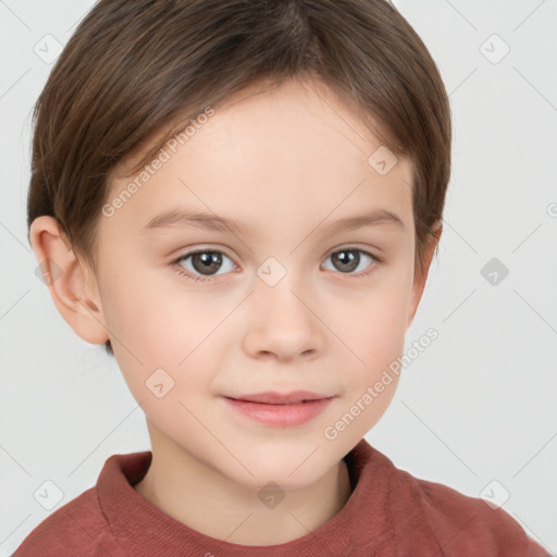 Joyful white child female with short  brown hair and brown eyes