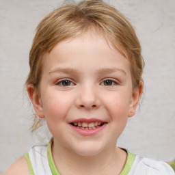 Joyful white child female with short  brown hair and brown eyes