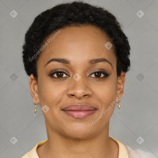 Joyful black young-adult female with short  brown hair and brown eyes