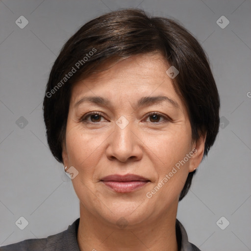 Joyful white adult female with medium  brown hair and brown eyes