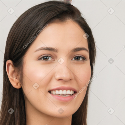 Joyful white young-adult female with long  brown hair and brown eyes