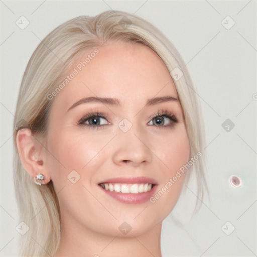 Joyful white young-adult female with medium  blond hair and blue eyes