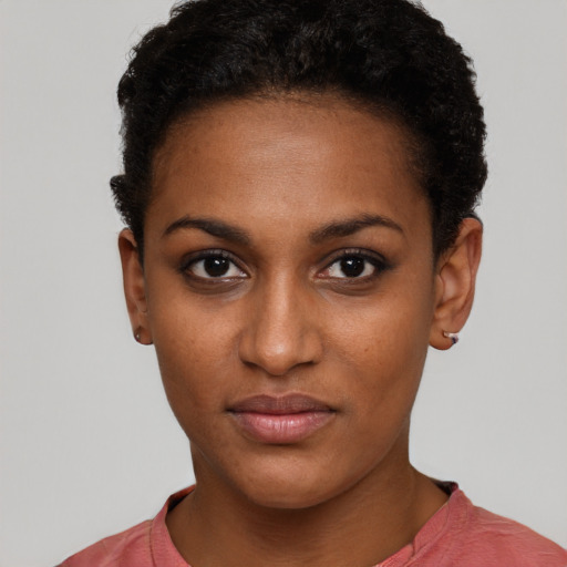 Neutral black young-adult female with short  brown hair and brown eyes