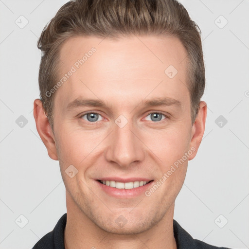 Joyful white adult male with short  brown hair and grey eyes