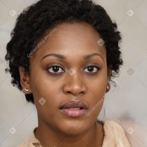 Neutral black young-adult female with medium  brown hair and brown eyes