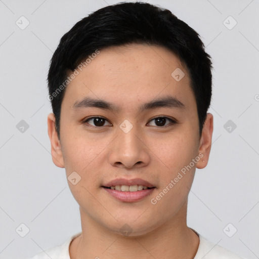 Joyful asian young-adult male with short  black hair and brown eyes