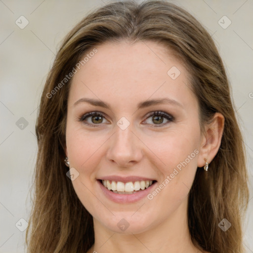 Joyful white young-adult female with long  brown hair and green eyes